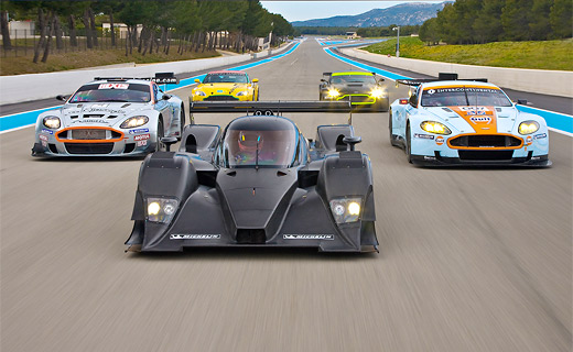 Фотографии из архивов компаний Porsche, BMW, Ferrari, Honda, Mazda, Lotus, Gulf, Aston Martin, Ford