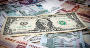 Доллар вырос до 52 руб. Евро дешевеет