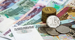Рубль растет к доллару и евро на внутреннем спросе